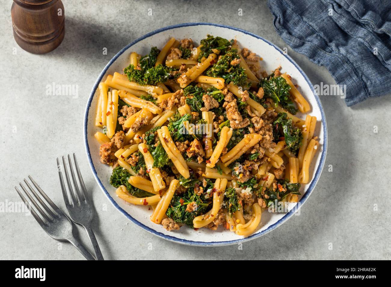 Homemade Kale and Sausage Caserecci Pasta with Cheese Stock Photo