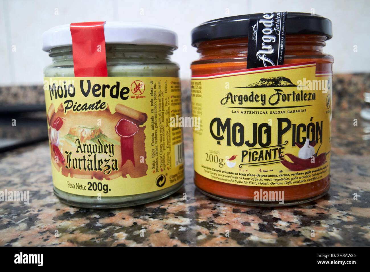 jars of canarian sauces mojo verde and mojo picante Lanzarote, Canary Islands, Spain Stock Photo