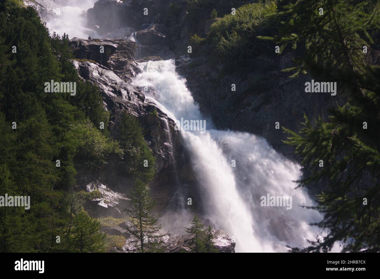 Beautiful view of a waterfall in a forest with trees Stock Photo - Alamy