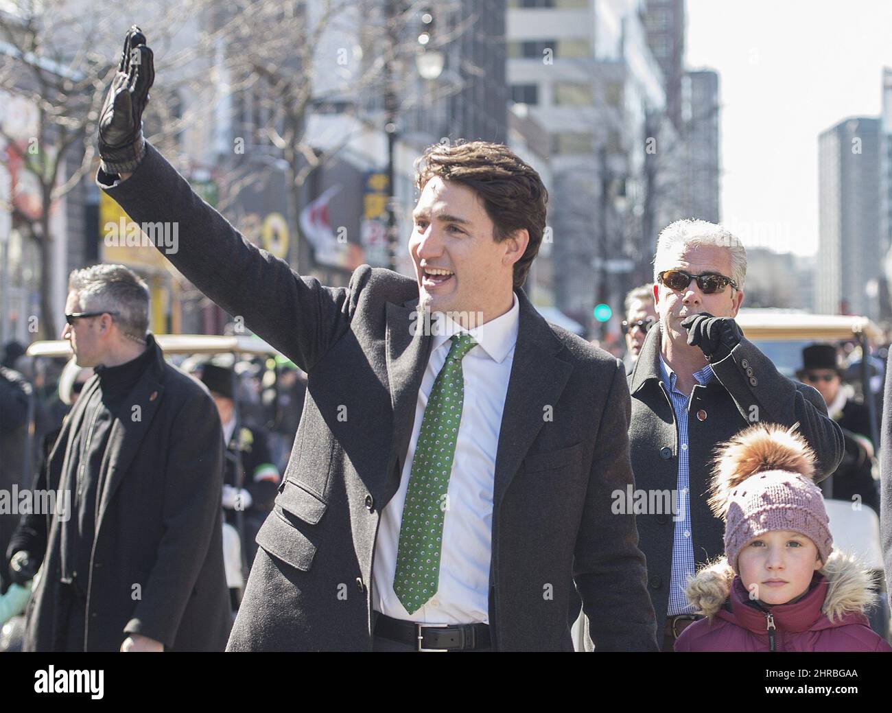 Prime Minister Justin Trudeau waves to the crowd as he walks with his ...