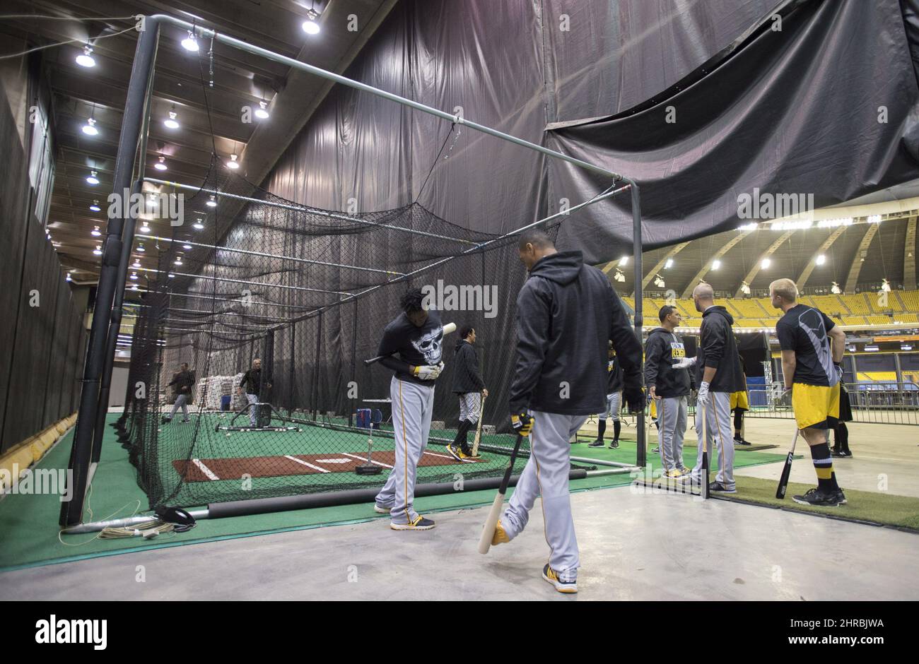 Members of the Pittsburgh Pirates take batting practice in a batting cage  behind the outfield wall at Olympic Stadium before an exhibition baseball  game, Saturday, April 1, 2017 in Montreal. (Paul Chiasson/The Canadian  Press via AP Stock Photo - Alamy
