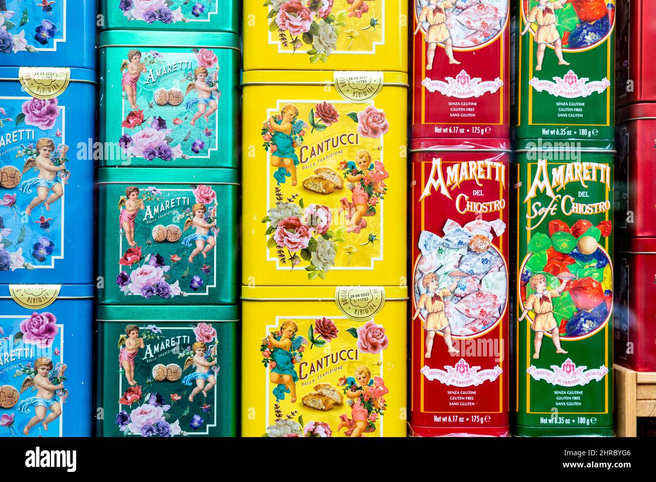 Display of colourful tins with Italian cookies at a deli (The Little Deli, Hitchin, Hertfordshire, UK) Stock Photo
