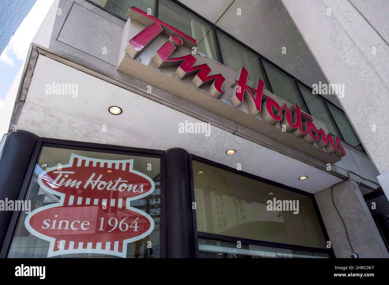 A Tim Hortons coffee shop in downtown Toronto is pictured on June 29, 2016. The CEO of the parent company of Tim Hortons is brushing off skepticism that the British will embrace its double-doubles and Timbits as it readies to open its first location in the United Kingdom next month. THE CANADIAN PRESS/Eduardo Lima Stock Photo