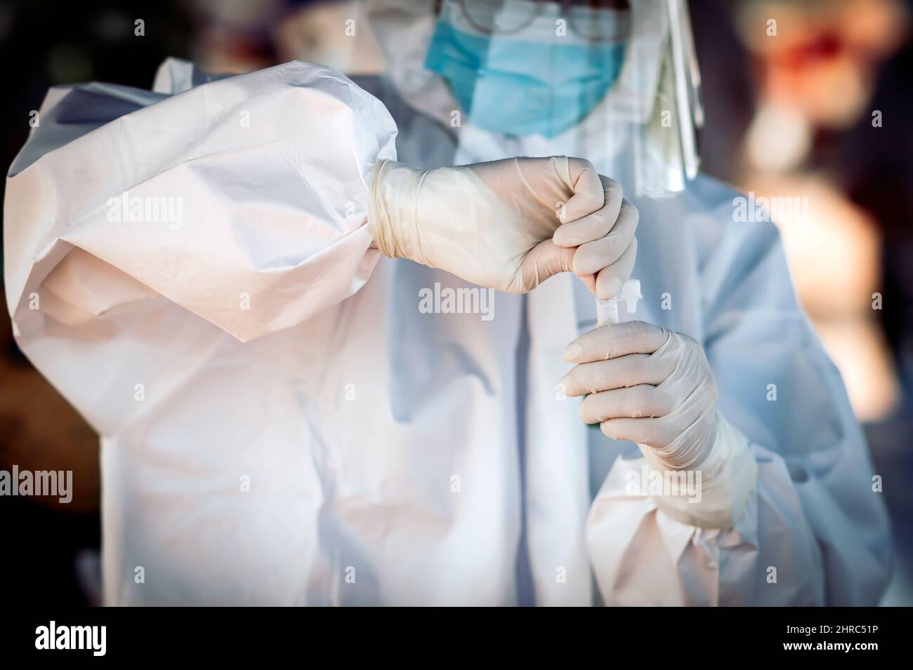 Medical professional doing a COVID antigen test Stock Photo