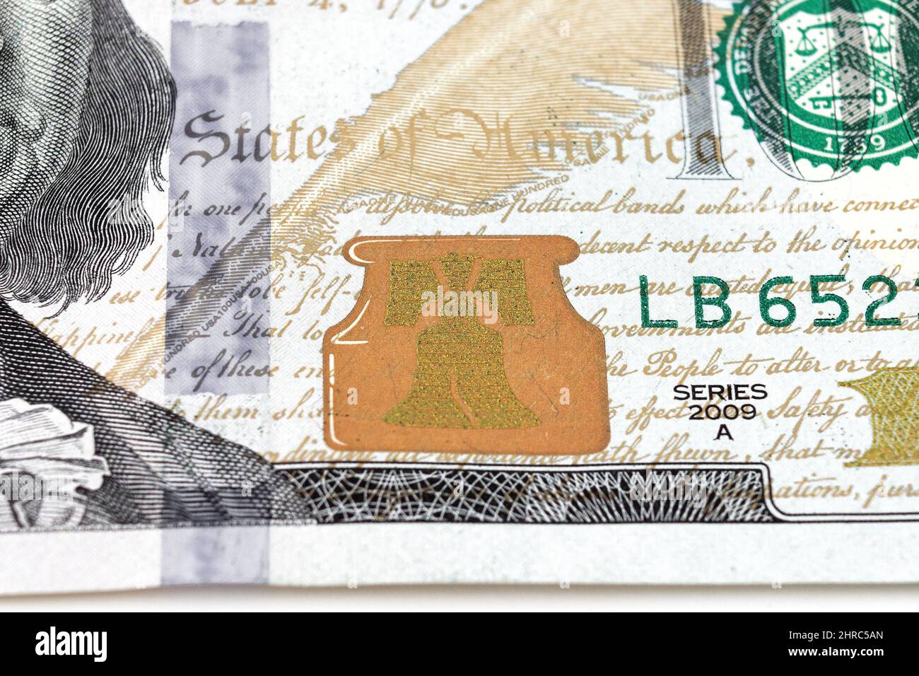US 100 dollar bill close up. Hundred dollars bill fragment on macro. Fragment of bills close-up. New sample money Stock Photo