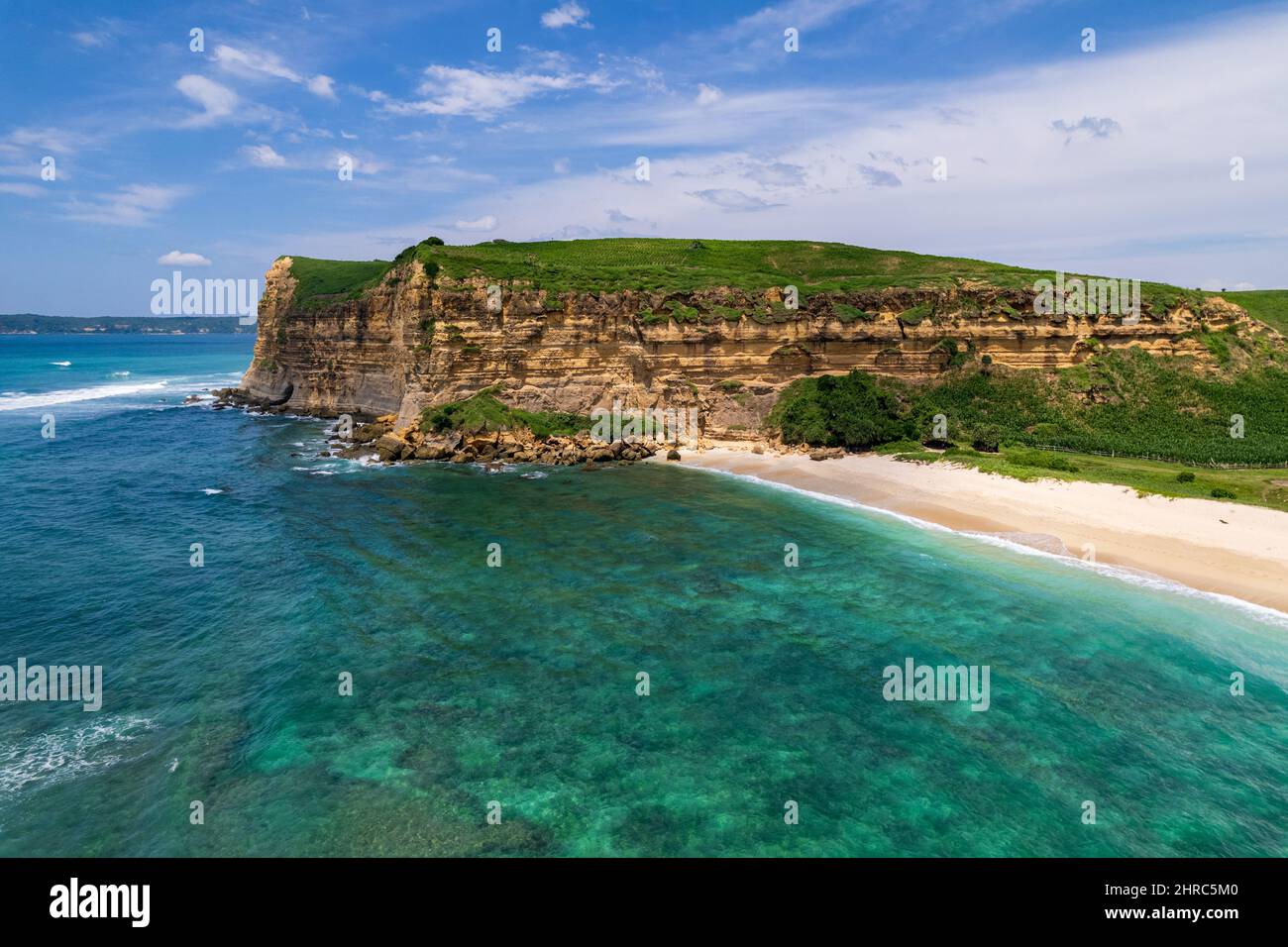 Aerial view of surfers on Sungkun Beach, Lombok, West Nusa Tenggara, Indonesia Stock Photo