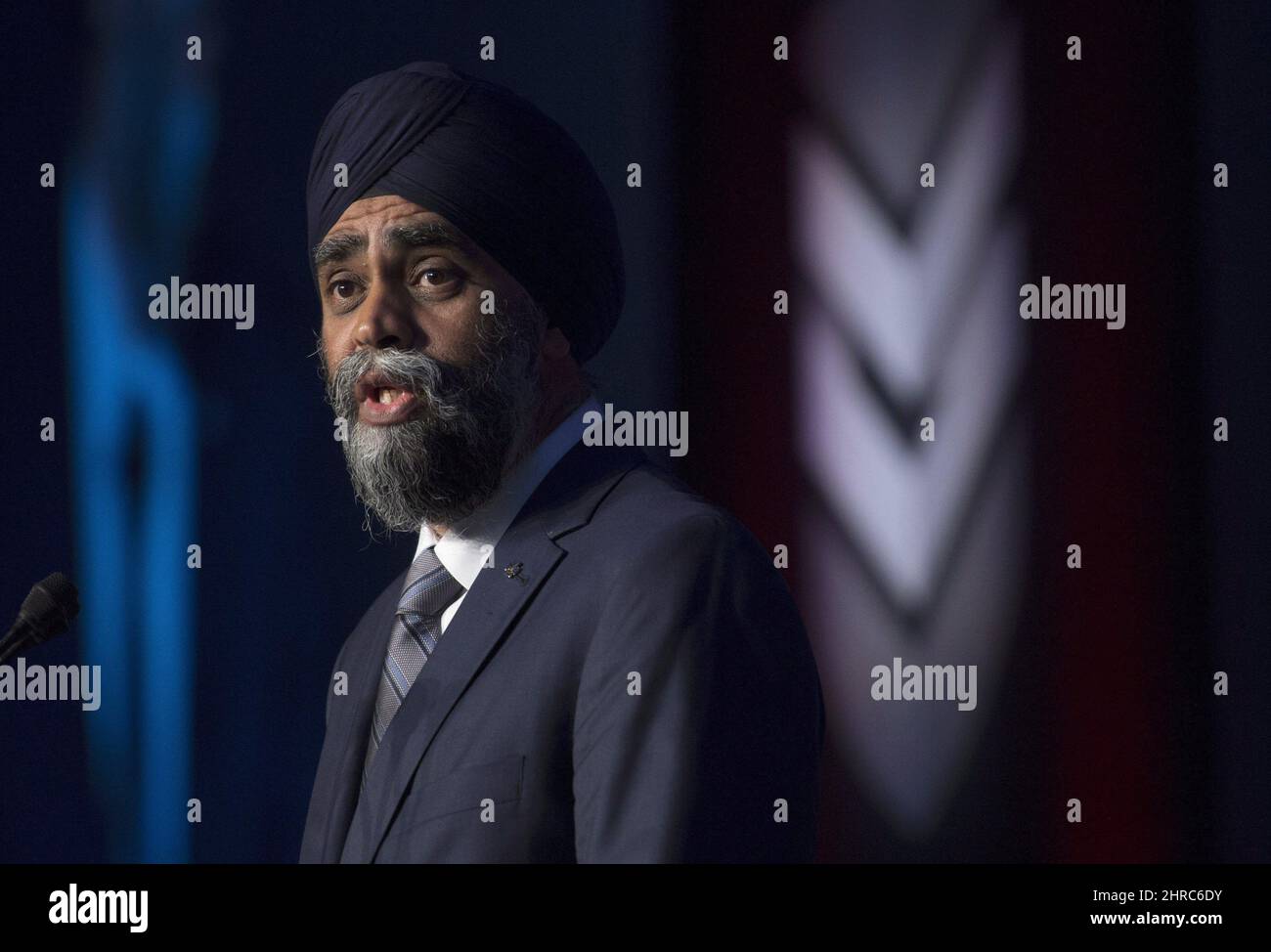Minister of National Defence Minister Harjit Sajjan speaks at the Canadian Association of Defence and Security conference in Ottawa, Wednesday May 31, 2017. Sajjan used a major speech Wednesday to the defence industry to blast American firm Boeing for picking a trade spat with Bombardier. THE CANADIAN PRESS/Adrian Wyld Stock Photo