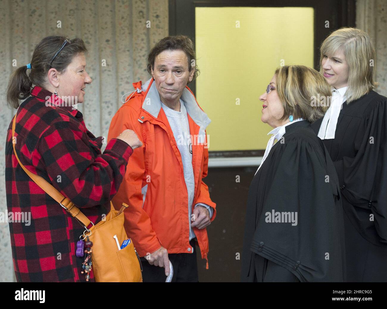 Taylor Samson's stepmother Karen Burke, his father Dean Samson, Crown  attorneys Susan MacKay and Kim McOnie, left to right, talk outside the  courtroom as jurors deliberate in the murder trial of William