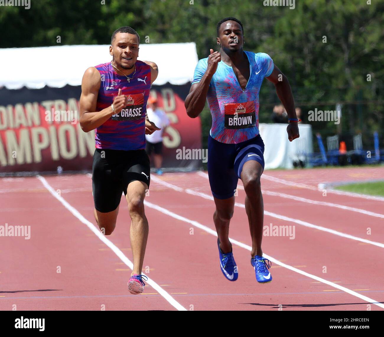 Andre De Gasse, left, takes the lead to the finish line beating Aaron ...
