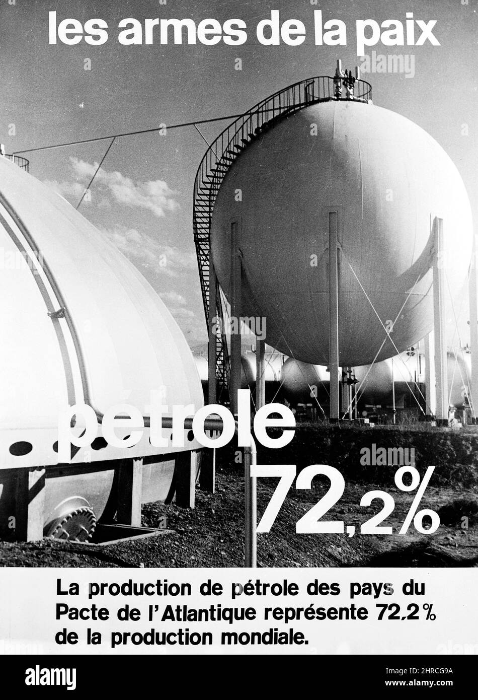 NATO (North Atlantic Treaty Organization) Poster (written in French) with photo of petroleum production. Caption in French states NATO nations produce 72.2% of the world's petroleum,' circa 1948. (Photo by Records of the Agency for International Development) Stock Photo