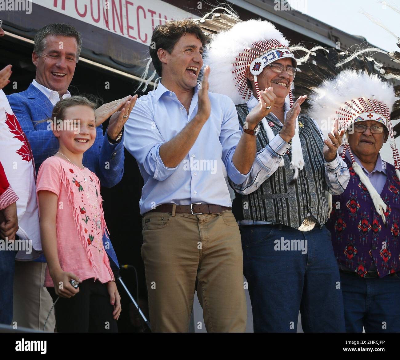 Prime Minister Justin Trudeau and his daughter Ella-Grace applaud ...