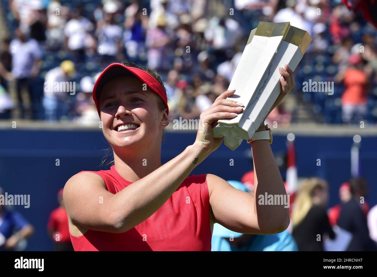 Ukraine's Elina Svitolina holds the winner's trophy after defeating