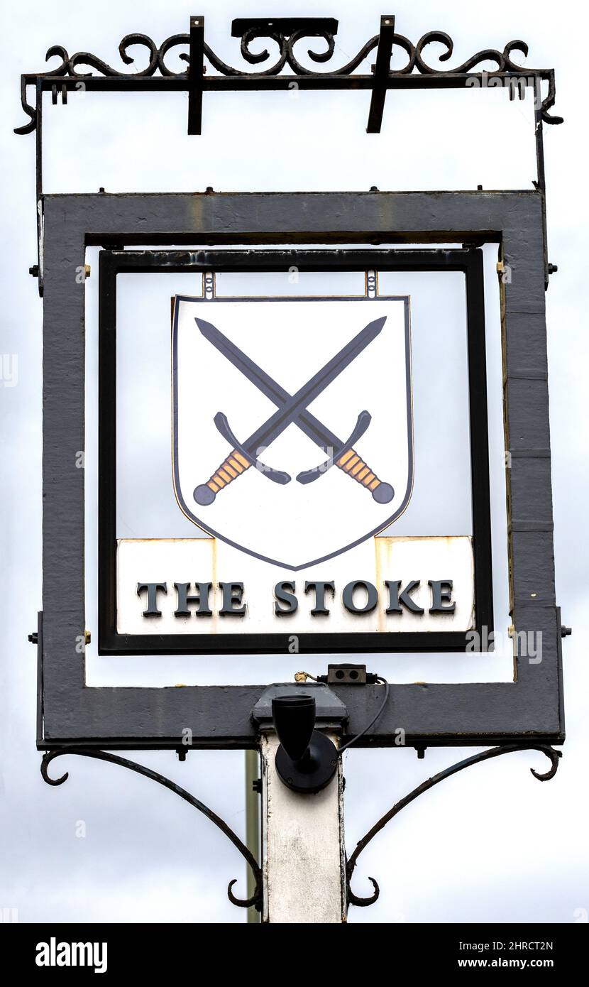 Traditional hanging pub sign at The Stoke public house, Stoke Road, Guildford, Surrey, UK. a Green King pub Stock Photo