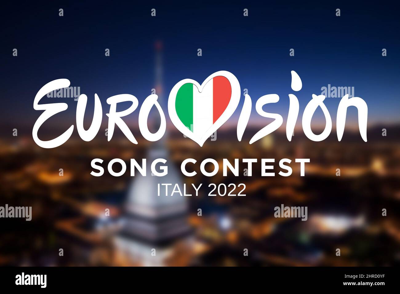 Eurovision Song Contest logo on on Turin's cityscape blurred background. The 66th edition will be held in Turin in May 2022. Turin, Italy - february 2 Stock Photo