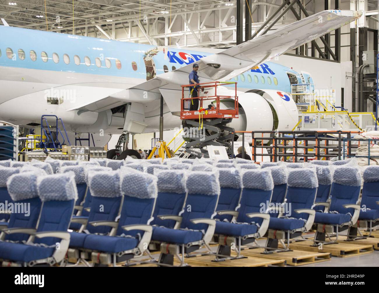 A Bombardier employee works on a CSeries 300 jet at the company's plant Thursday, September 28