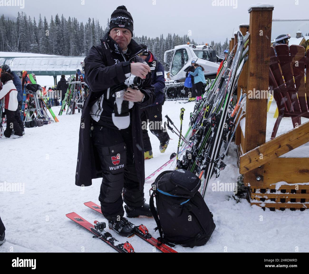 Germany's head coach Juergen Graller returns to the lodge after a power