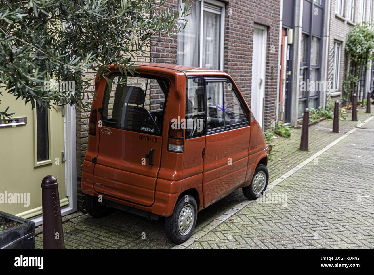 Little minicar canta XL parked in the street Stock Photo
