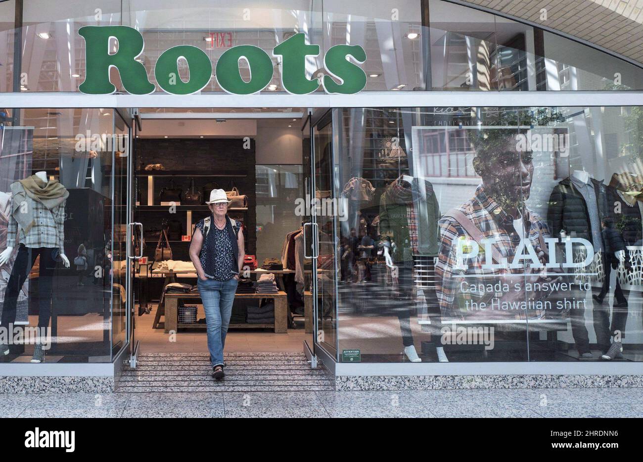 The storefront of a Roots location in Toronto is pictured on Thursday ...