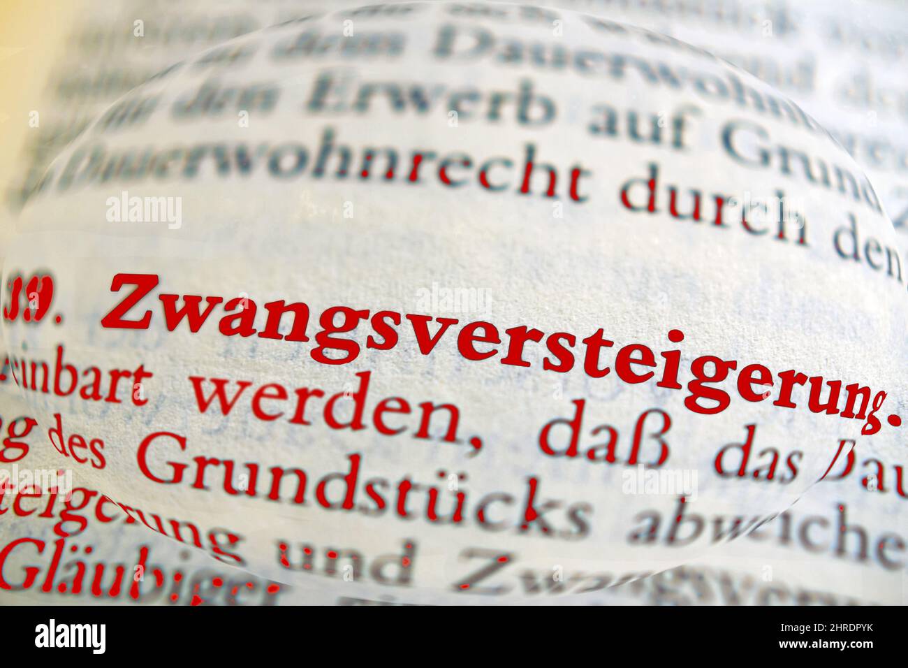 Closeup shot of a German word Zwangsversteigerung in a dictionary Stock Photo