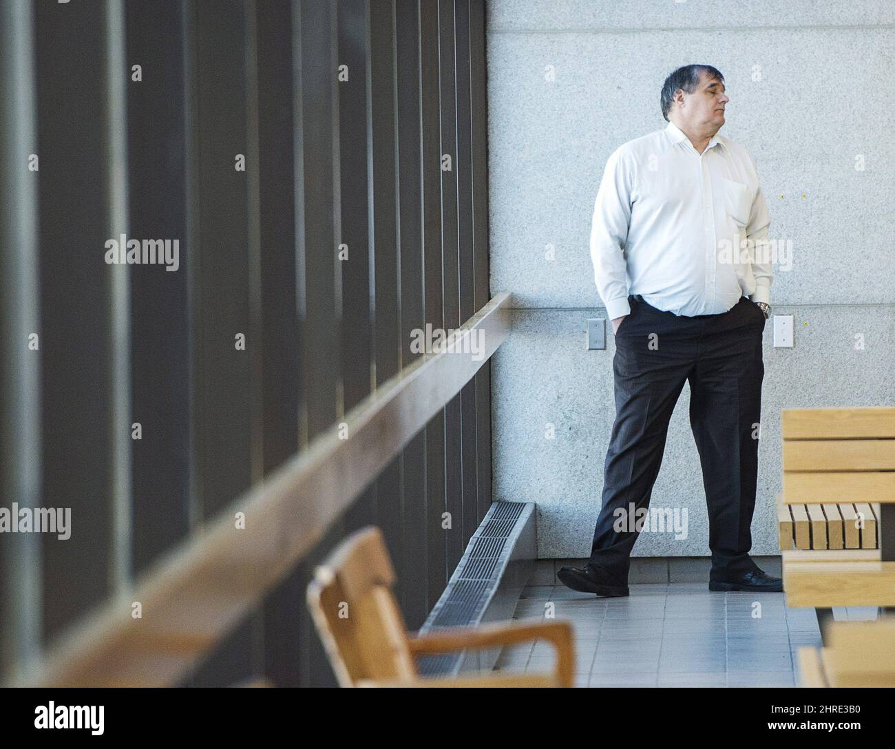 Rail traffic controller Richard Labrie, waits in the hallway as the jury deliberates for the fourth day Sunday, January 14, 2018 in Sherbrooke, Que. THE CANADIAN PRESS/Ryan Remiorz Stock Photo