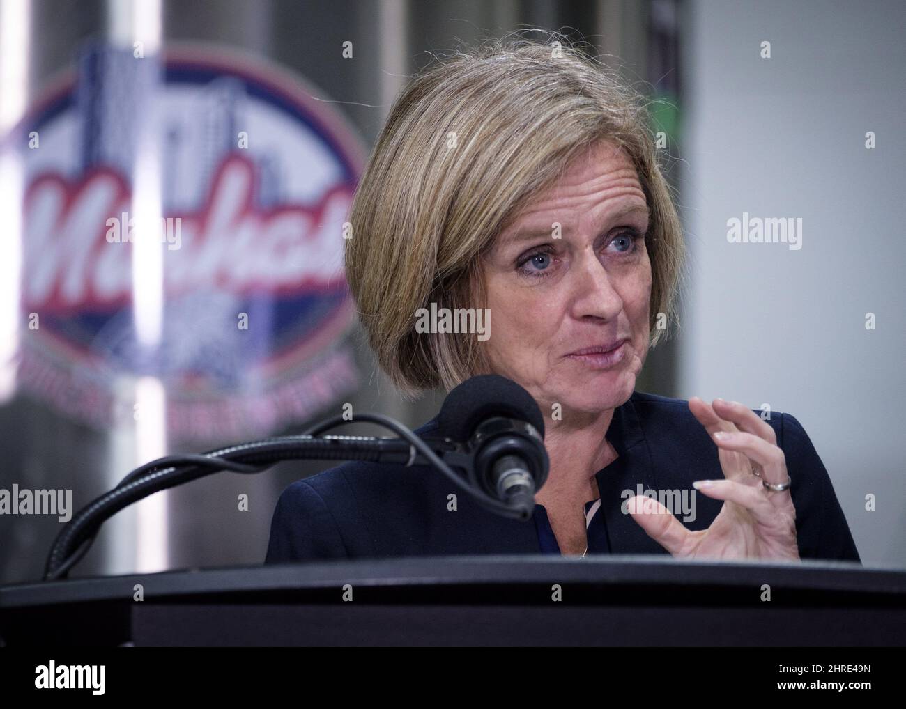 Alberta Premier Rachel Notley makes an announcement at a microbrewery
