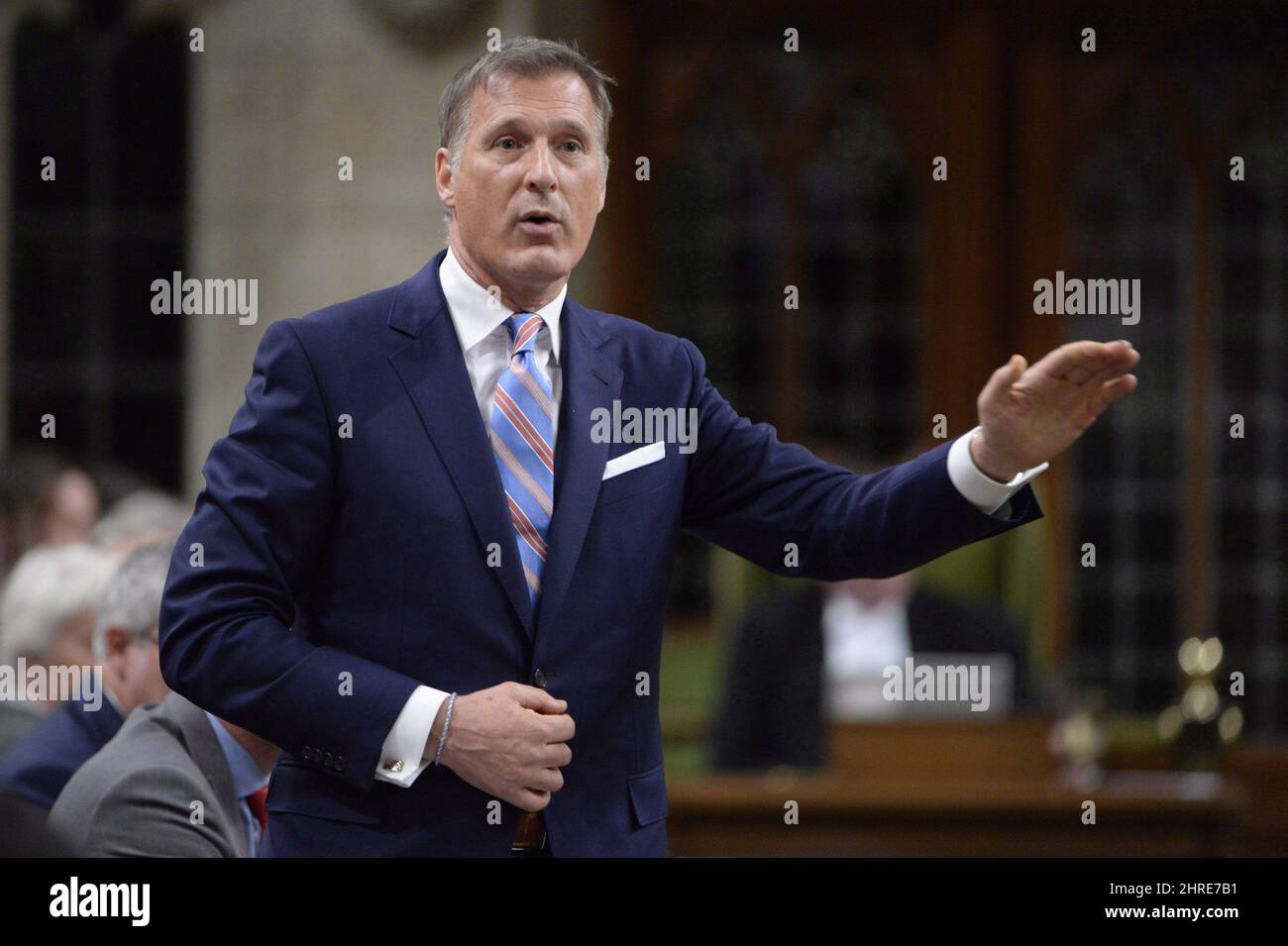 Quebec member of Parliament Maxime Bernier, who finished a close second to Andrew Scheer in last year's Conservative Party leadership vote, says he wants to know why disgraced former MP Rick Dykstra was allowed to run in the 2015 election. Bernier rises during question period in the House of Commons on Parliament Hill in Ottawa on Thursday, Sept.28, 2017. THE CANADIAN PRESS/Adrian Wyld Stock Photo