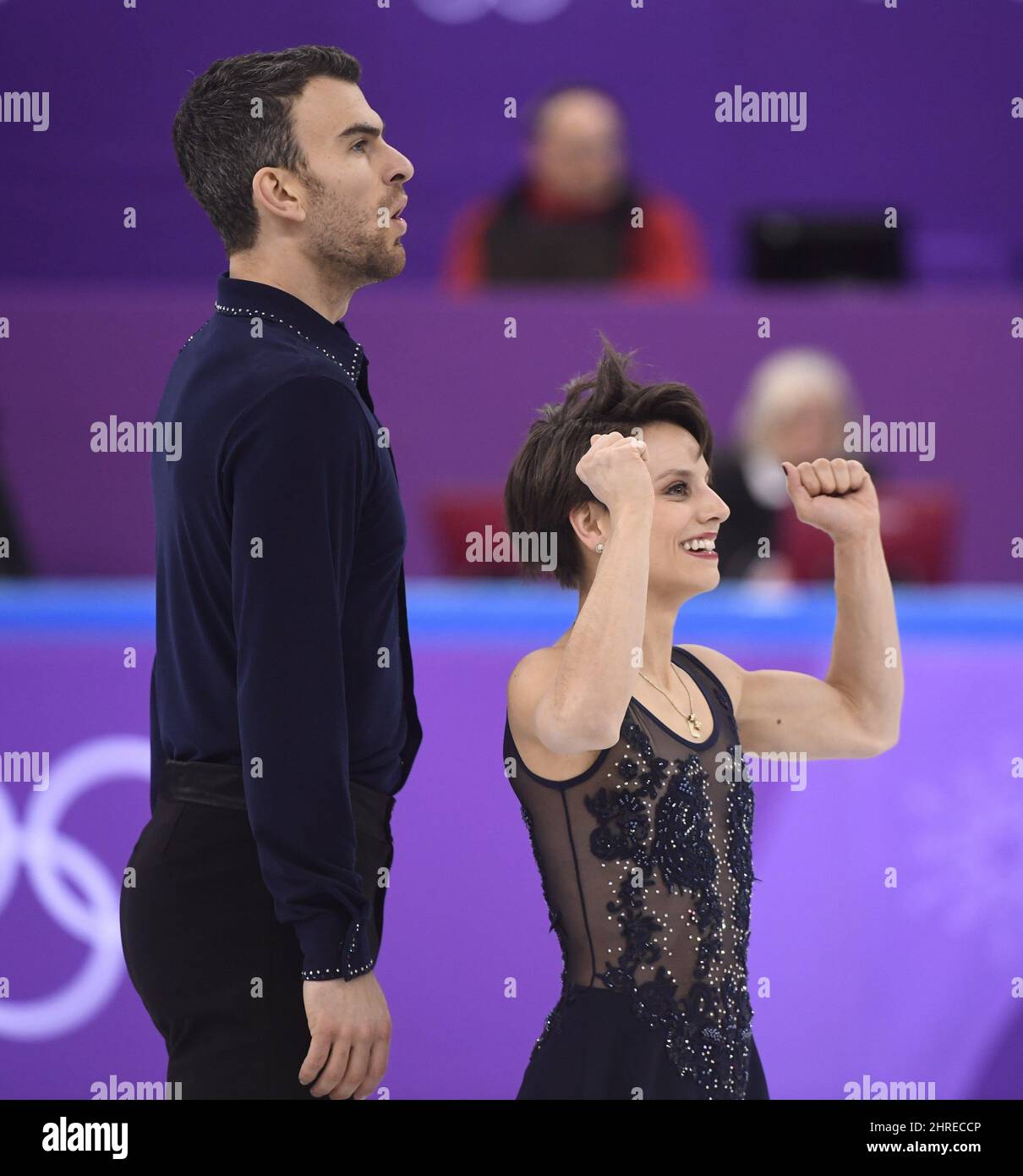Canada's Meagan Duhamel and Eric Radford react at the end of their