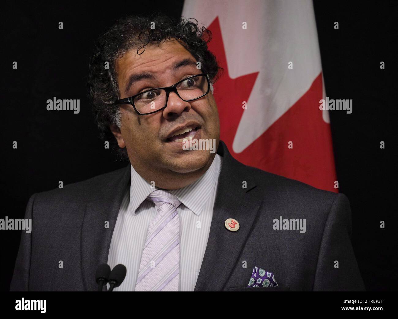 Calgary Mayor Naheed Nenshi speaks to reporters in Calgary, Alta., Friday,  Sept. 15, 2017. Calgary walked back a city administration report stating  the provincial and federal governments would contribute money to a
