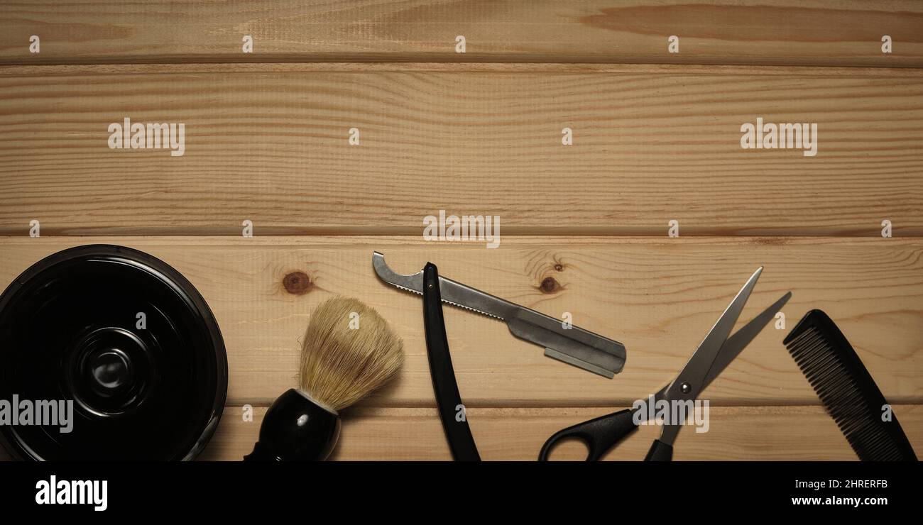 Barber tools on wooden background Stock Photo