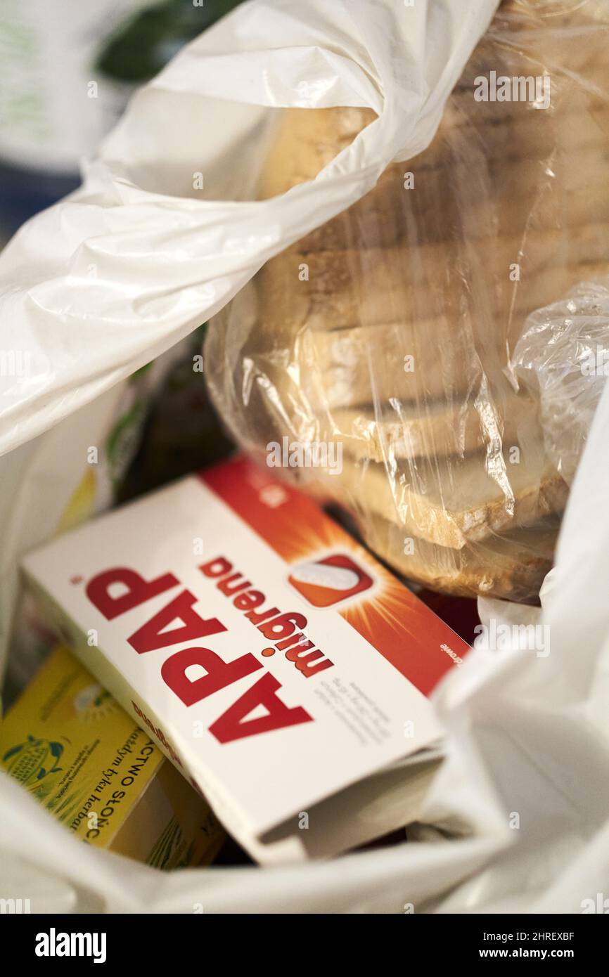 Polish Apap Migraine Pain Killers In A Plastic Shopping Bag With Bread Polish Apap Migraine Pain Killers In A Plastic Shopping Bag With Bread