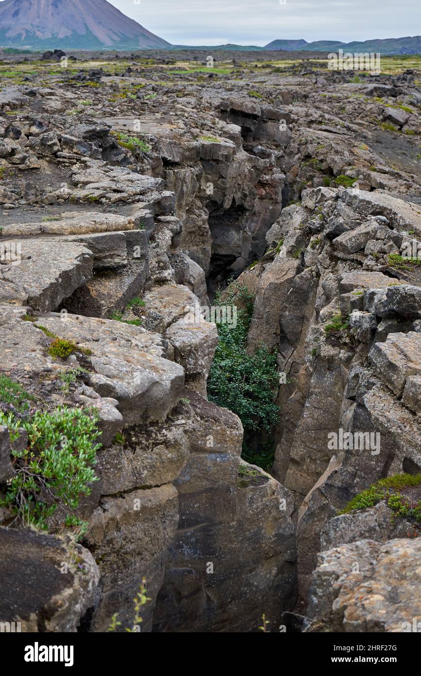 Vertical shot of the Grjotagja fissure in Iceland Stock Photo