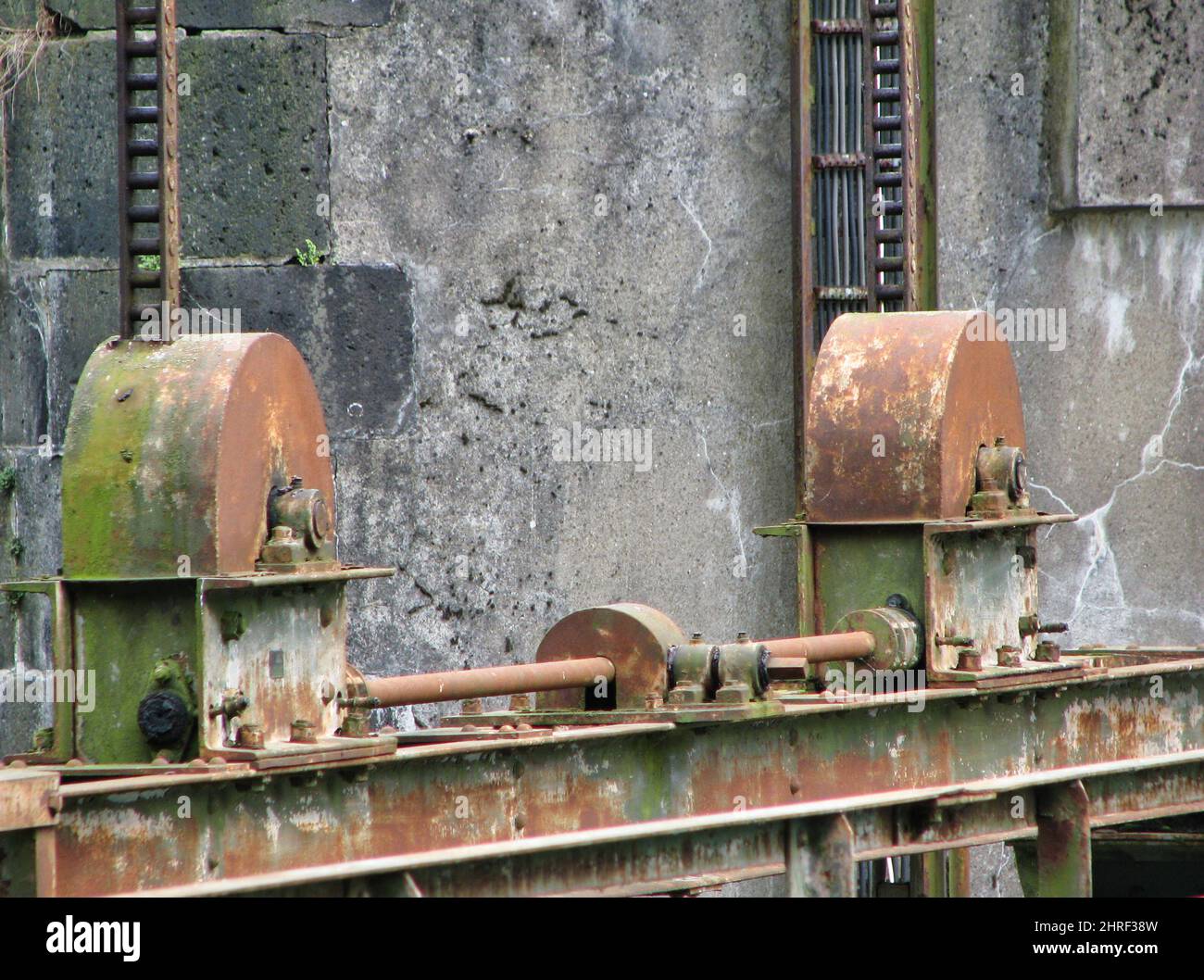 Mechanics of an old weir. The metal has already developed a slight ...
