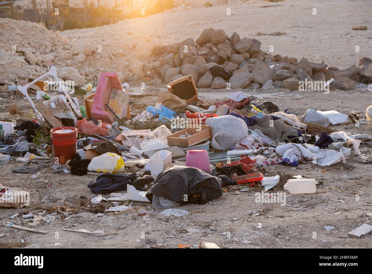 A heap pile of rubbish waste at a construction site. Ground and stone