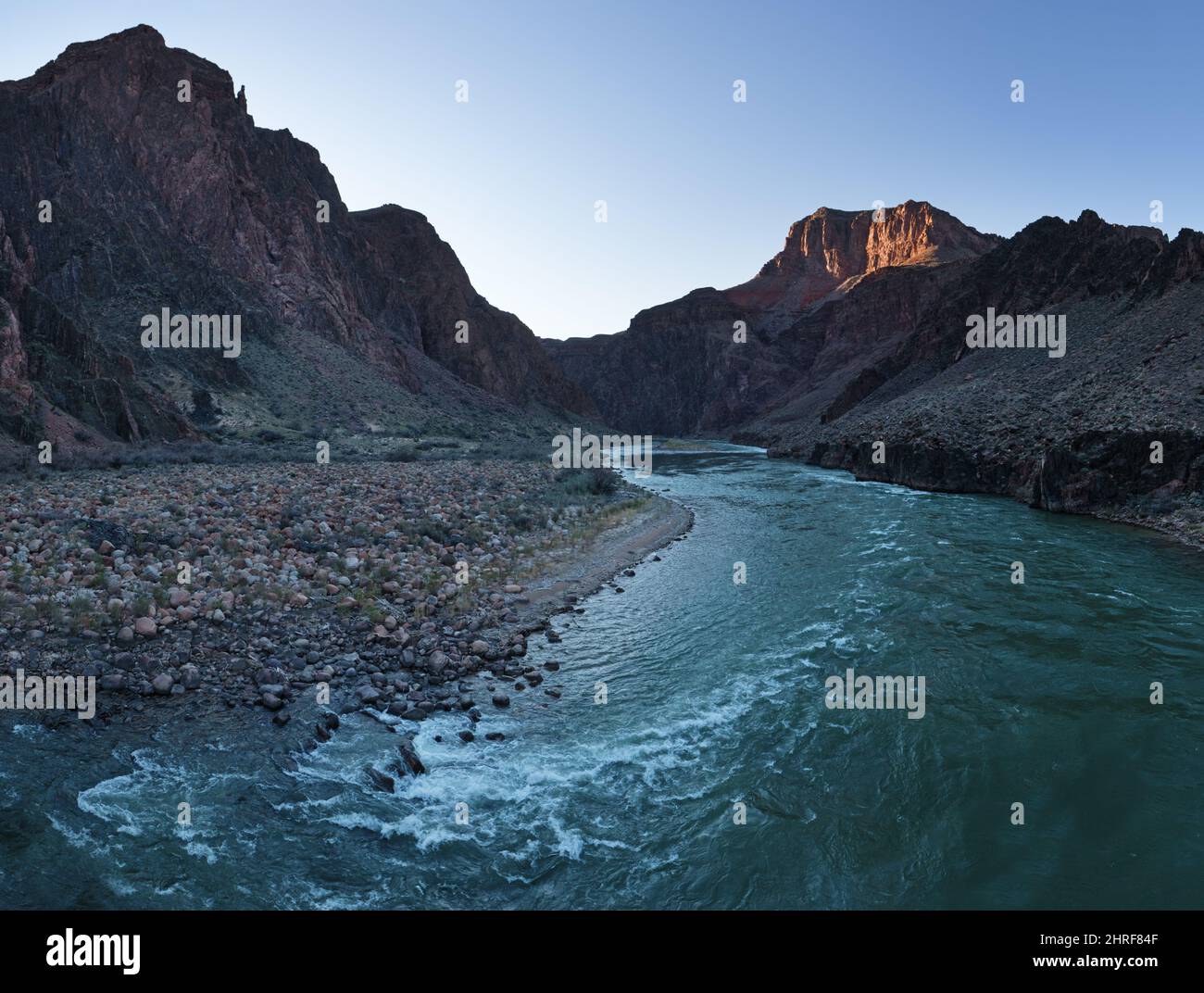 the Colorado River flows in the inner gorge of Grand Canyon National Park in Arizona Stock Photo