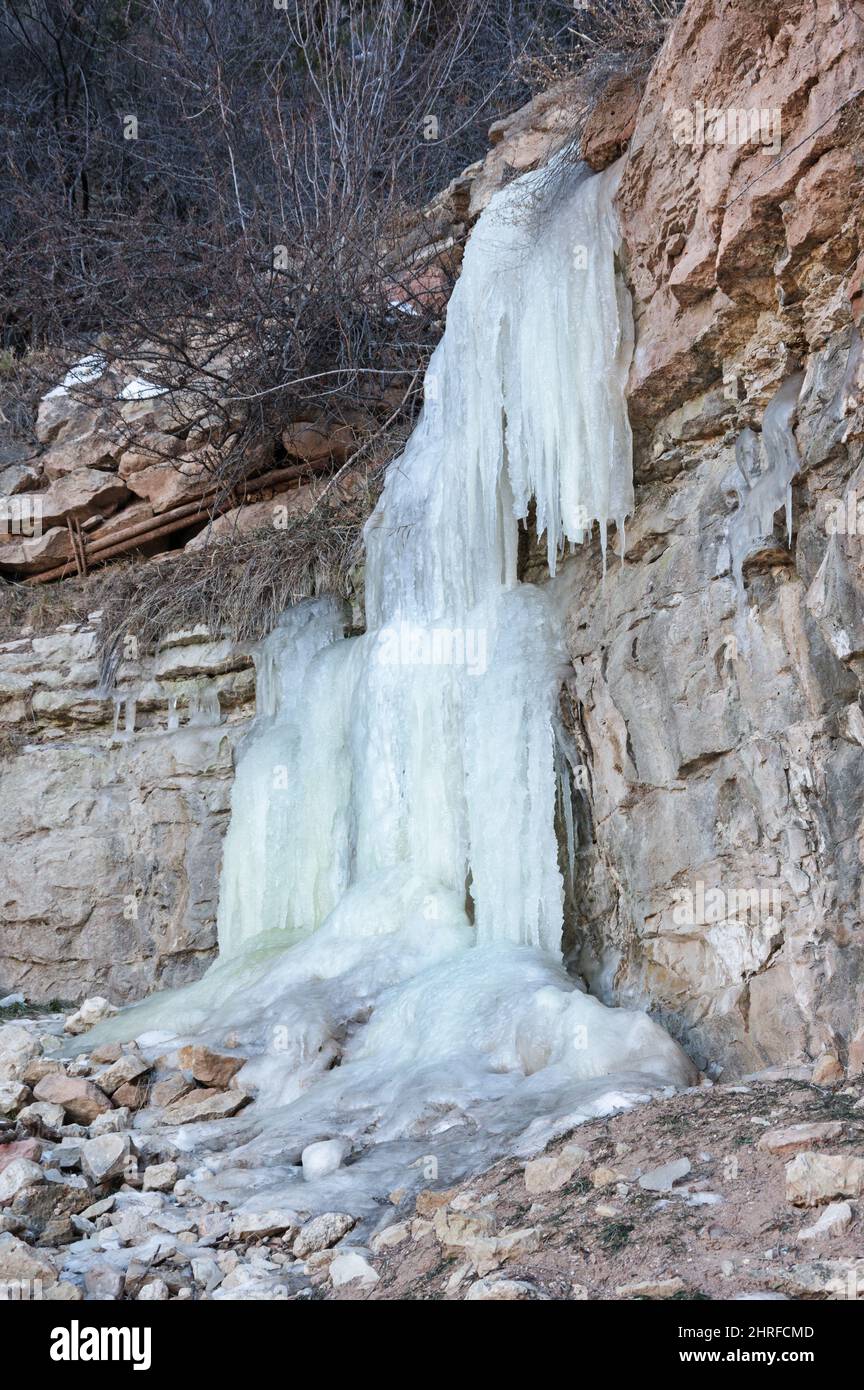 ice and icicles growing on the side of the Bright Angel Trail in the Grand Canyon on a cold winter day Stock Photo