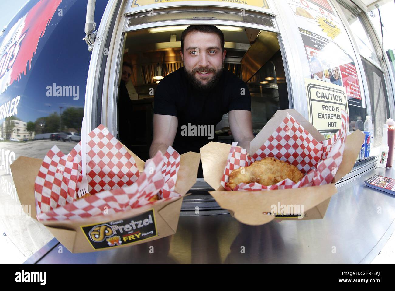 Anthony Faraci poses in his food truck as he relaunches his late uncle