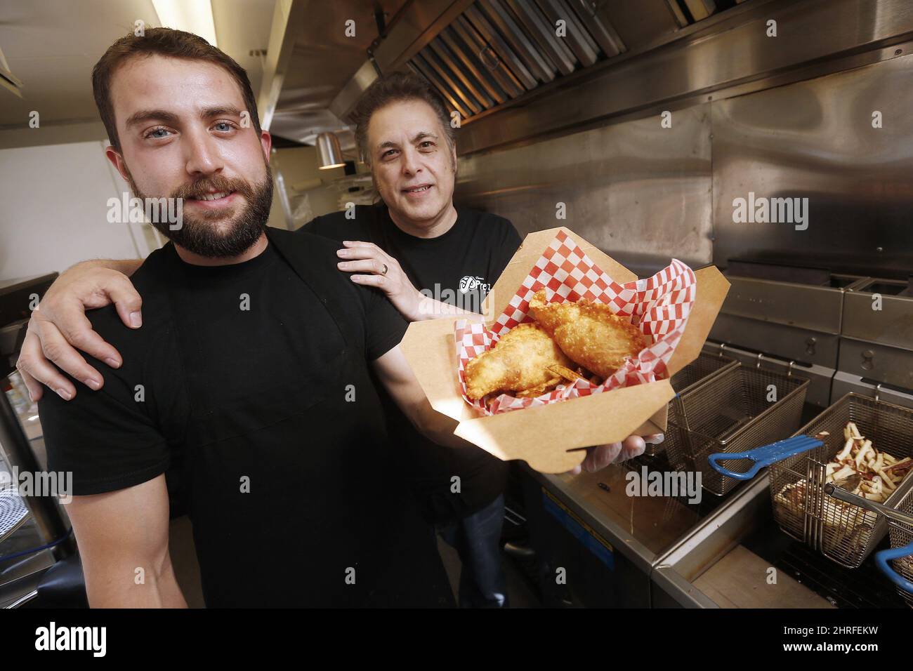 Anthony Faraci and his father Phil are photographed in their food truck