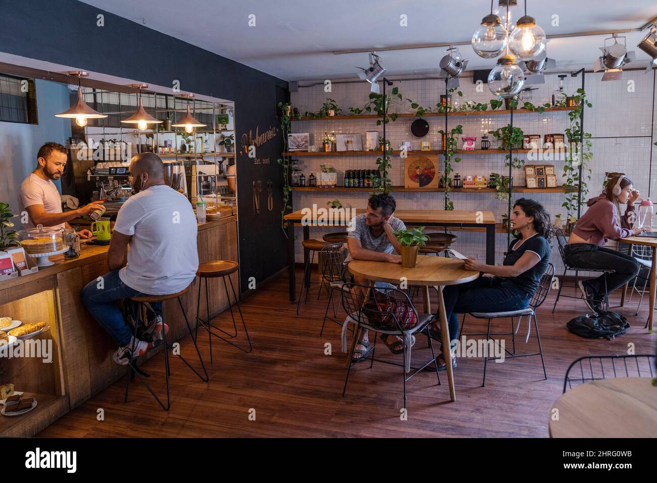 25 February 2022, Colombia, Medellín Guests sit on the terrace of the