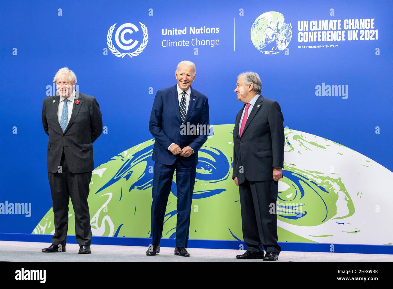 U.S President Joe Biden poses for photos with British Prime Minister Boris Johnson, left, and U.N. Secretary General Antonio Guterres, at the U.N. Climate Change Conference COP26 at the Scottish Event Campus, November 1, 2021 in Glasgow, Scotland. Stock Photo