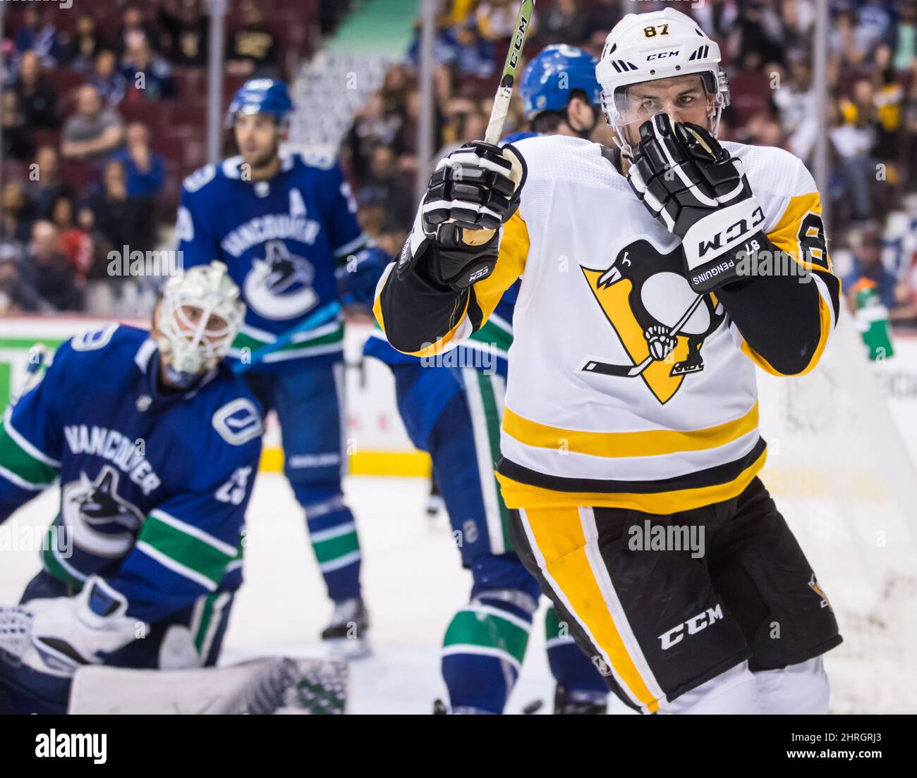 Pittsburgh Penguins' Sidney Crosby (87) takes out his mouthguard after