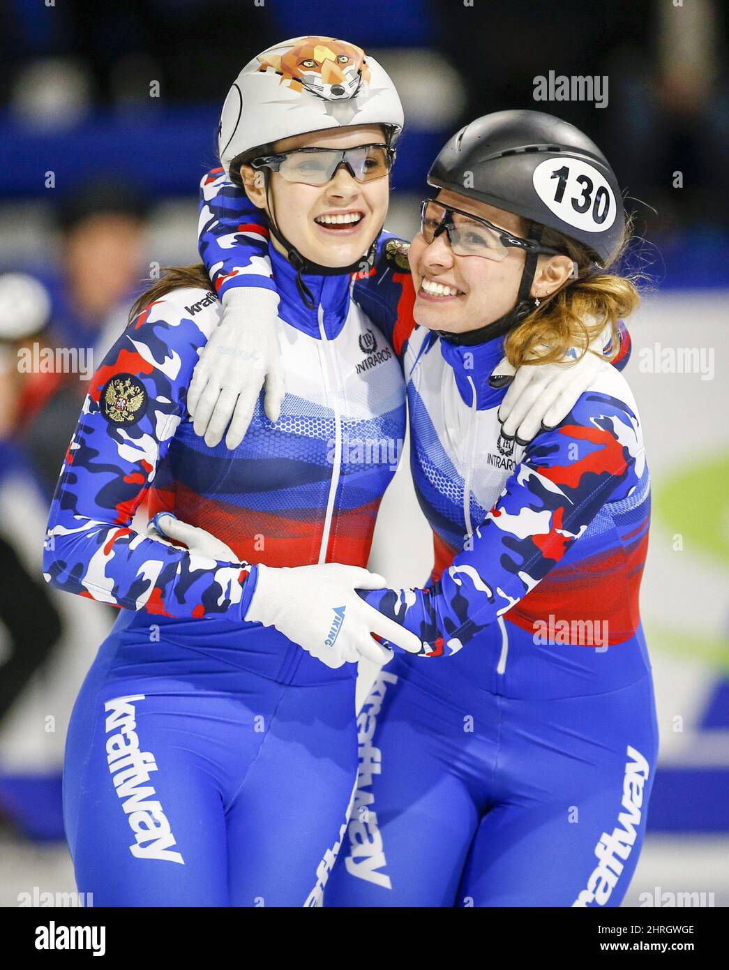 Russia's Sofia Prosvirnova, left, and teammate Emina Malagich celebrate their team winning the women's 3000-metre relay finals at the ISU World Cup short track speed skating event in Calgary, Sunday, Nov. 4, 2018. THE CANADIAN PRESS/Jeff McIntosh Stock Photo