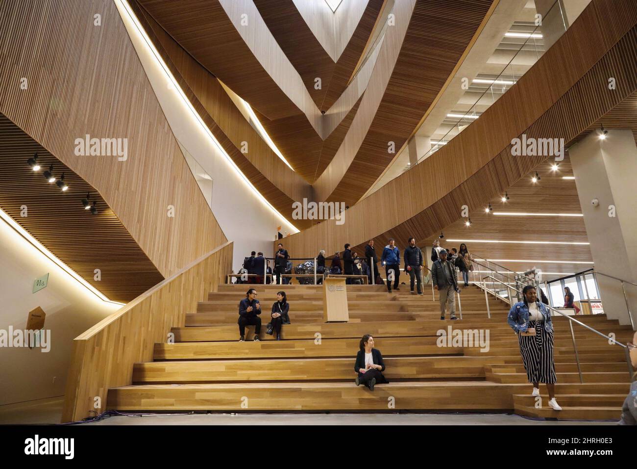 Visitors explore the new Calgary Library following its opening in Calgary, Alta., Thursday, Nov. 1, 2018. A number of visitors to the new central library in East Village say they were frustrated by oversights they encountered during their trip that hindered the experience. THE CANADIAN PRESS/Jeff McIntosh Stock Photo