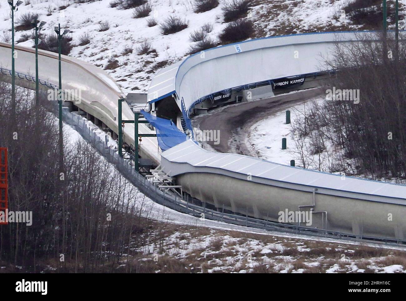 The judge who led an inquiry into the deaths of teenage twins killed during an after-hours bobsled run says Canada Olympic Park should explore using infrared cameras to help prevent similar tragedies. A tarp covers the intersection of the bobsled and luge tracks at Canada Olympic Park in Calgary on February 6, 2016. Jordan and Evan Caldwell, who were 17, were part of a larger group that snuck onto the grounds of the WinSport facility with plastic sleds and headed down the icy track, which was built for the 1988 Olympics. THE CANADIAN PRESS/Larry MacDougal Stock Photo
