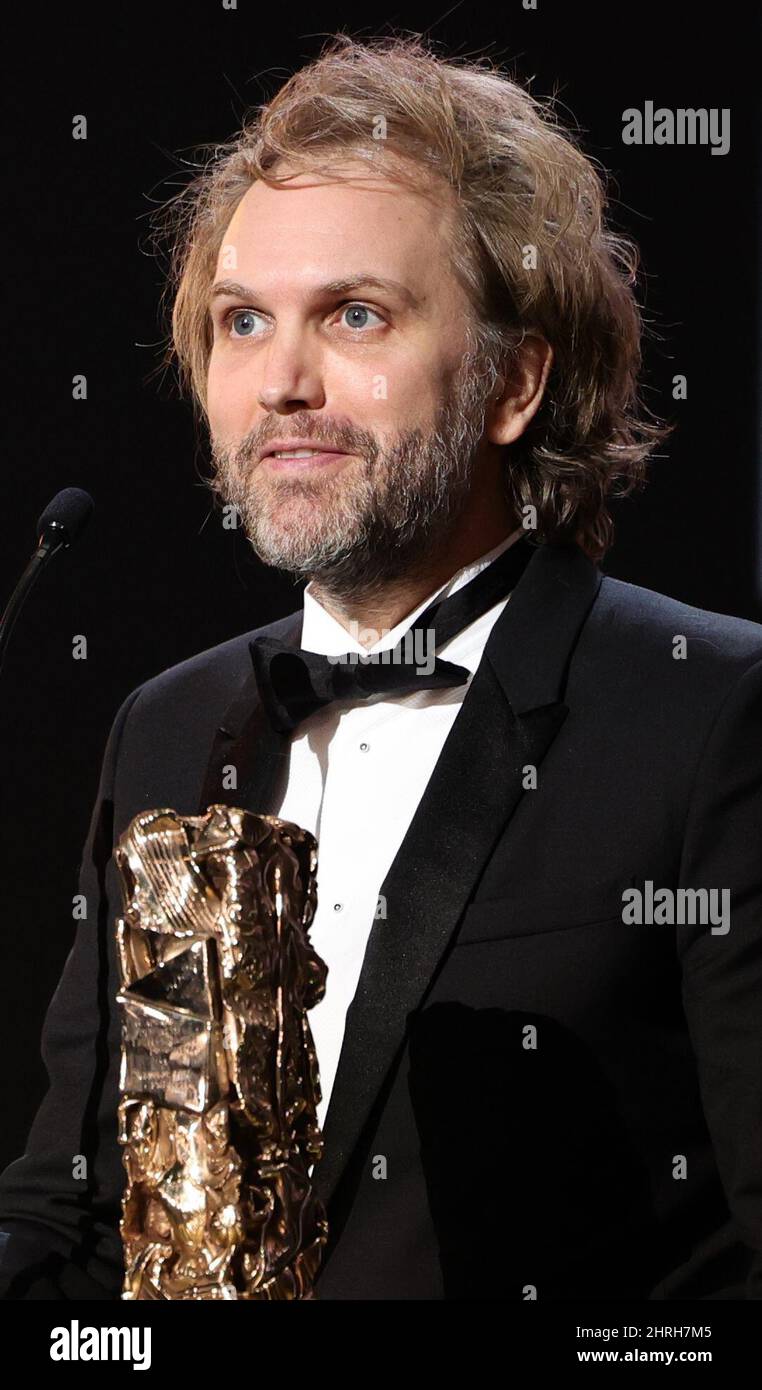 Director Florian Zeller reacts as he receives the Best Foreign Film Award  for the film "The