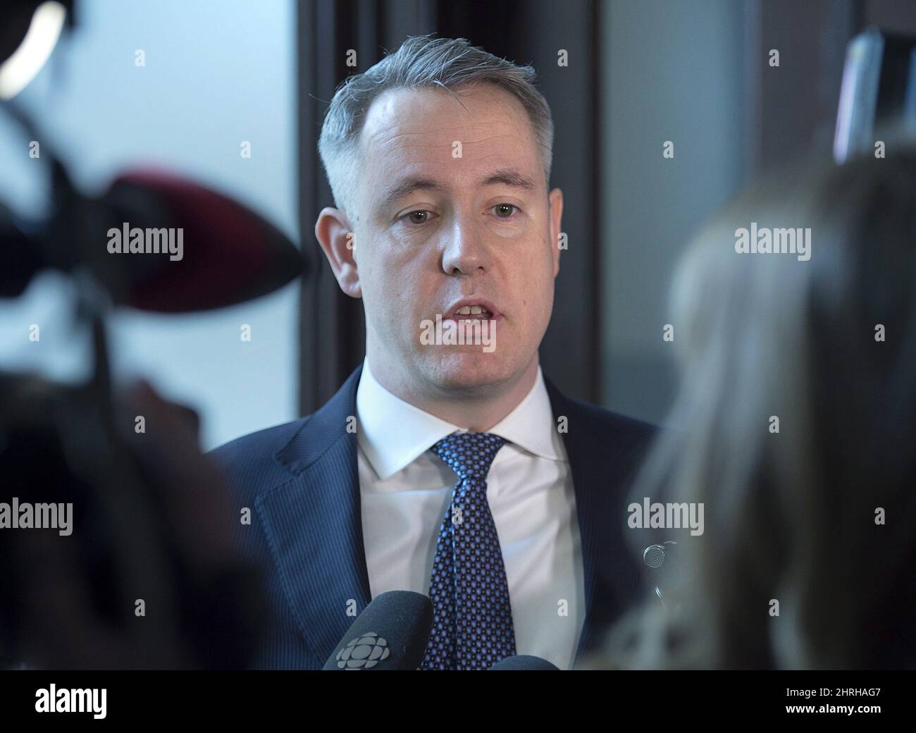 Crown attorney Peter Dostal talks with reporters at a court appearance