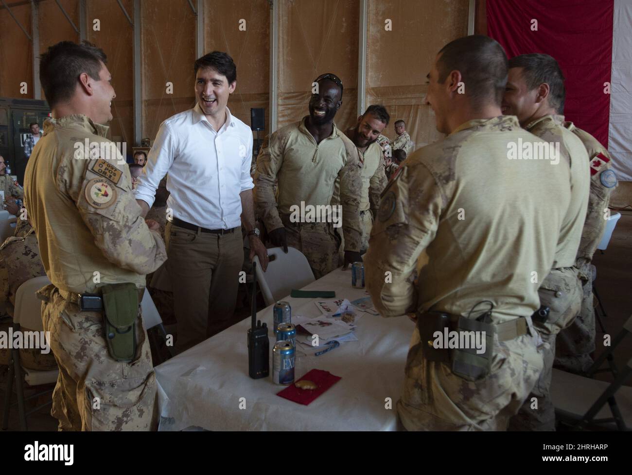 Canadian Prime Minister Justin Trudeau speaks with members of the ...
