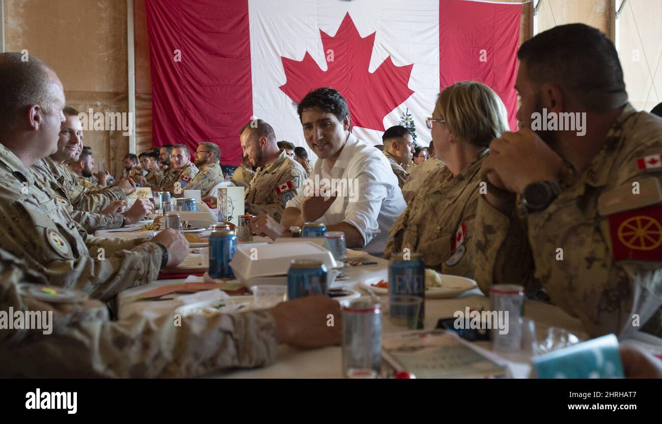 Canadian Prime Minister Justin Trudeau speaks with members of the ...