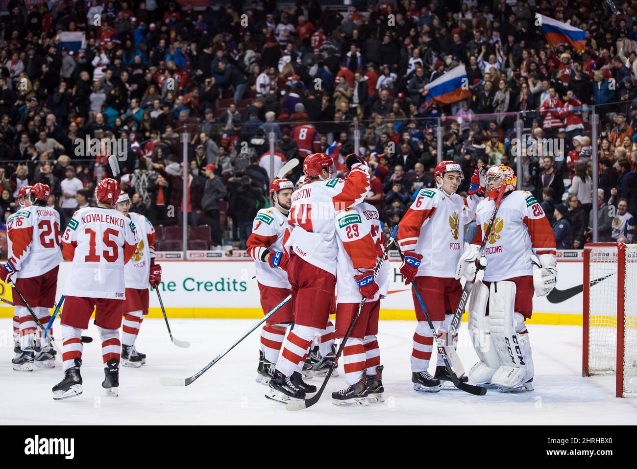 Russia goalie Pyotr Kochetkov, right, and his teammates celebrate their