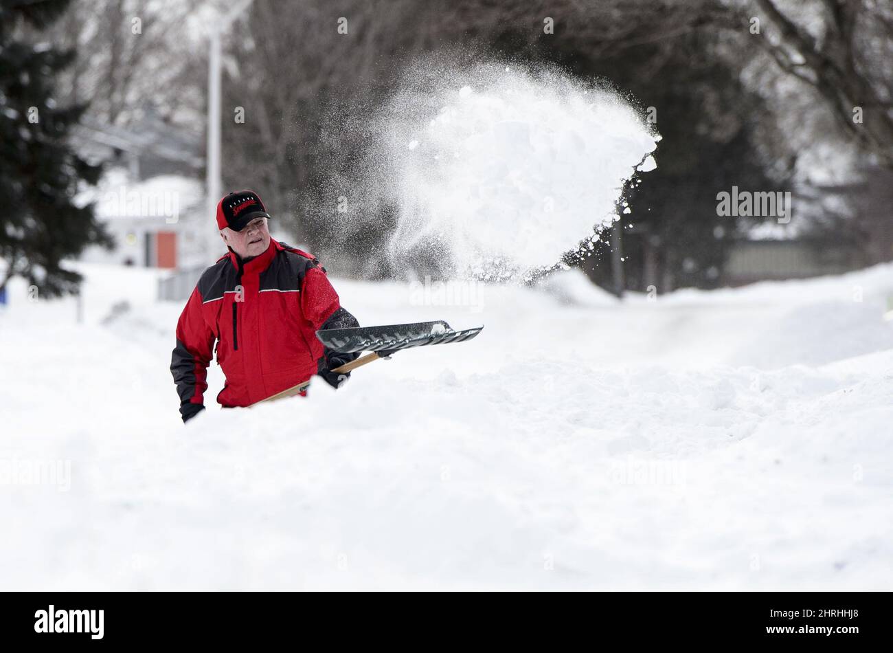 Jeff Maguire digs out his driveway in Carleton Place, Ont., on Monday