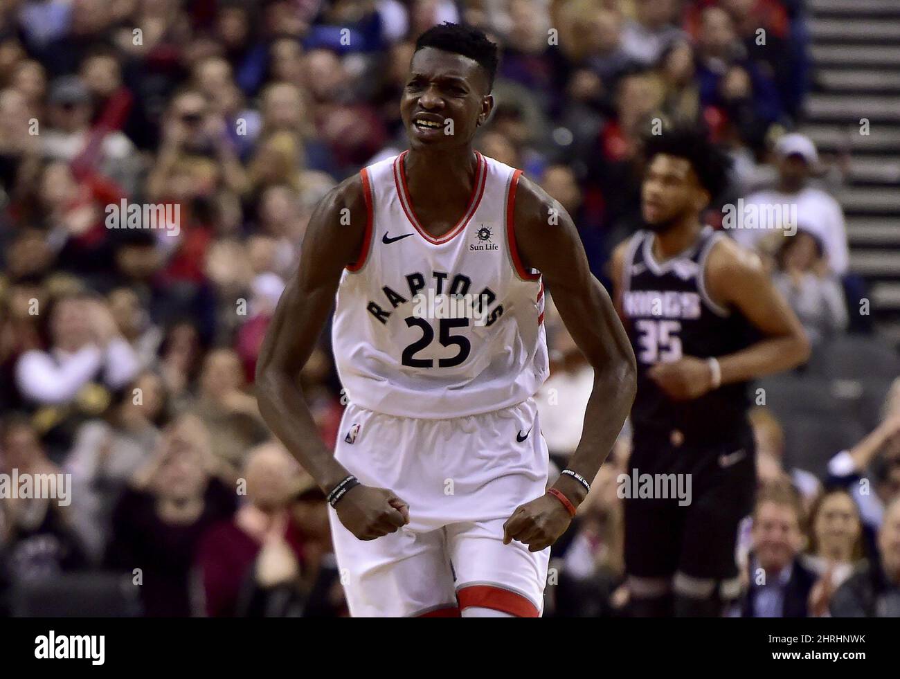 Toronto Raptors forward Chris Boucher (25) celebrates after dunking the  ball during second half NBA basketball action against the Sacramento Kings  in Toronto on January 22, 2019. The Toronto Raptors have upgraded